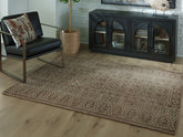Bay Furniture Gallery - Ashley Furniture - Merrittman Rug - 5' x 7' Area Rug / Brown/Ivory - R407702